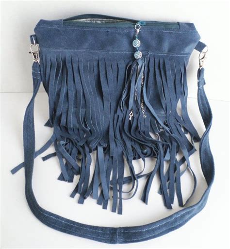 blue suede fringe purse.